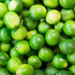 Pile of Green Limes on Market Pattern