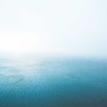 Blue Endless Ocean in Fog